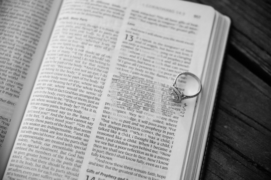 engagement ring on a Bible verse