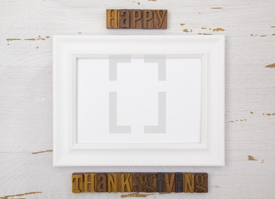 frame with happy thanksgiving wood stamps 