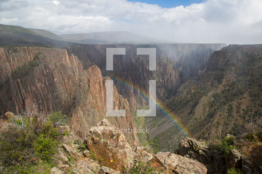 rainbow over a canyon 