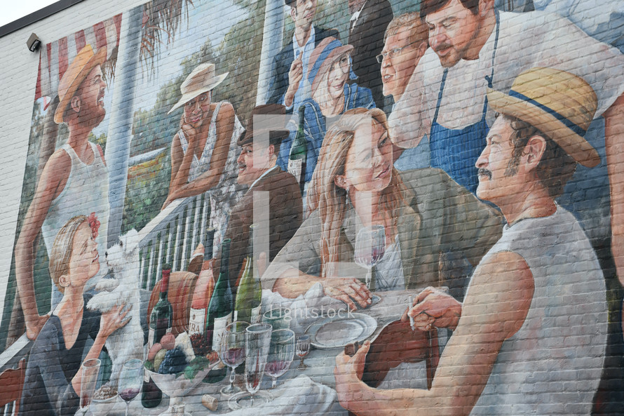 street art painting of outdoor diners 