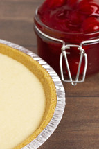 cheese cake and Thick Cherry Pie Filling in a Glass Canning Jar