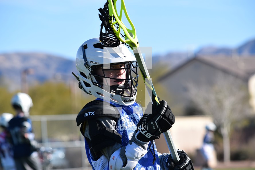 lacrosse player warming up before a game 