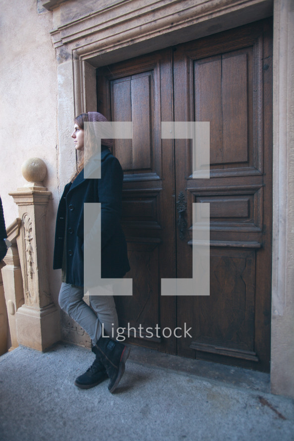 woman standing in a doorway