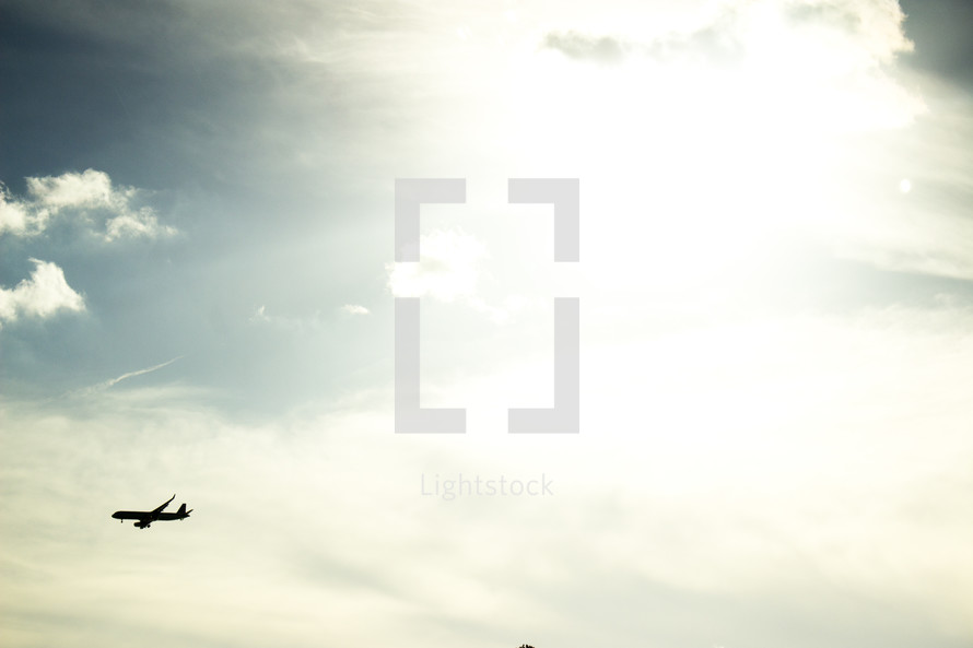 silhouette of a plane in flight 