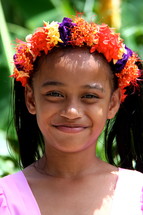 Young polynesian girl with flowers in her hair. pigtails, smile, young girl, girl, happy