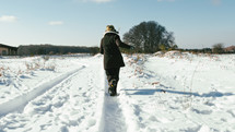 woman runs in fresh snow