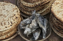 fish and bread in baskets 