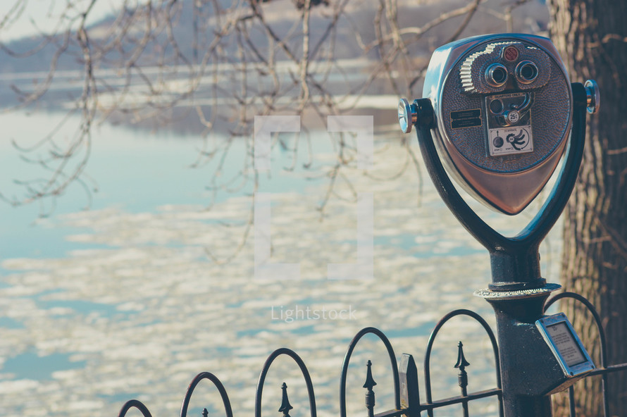 view finder scope on a lake shore 
