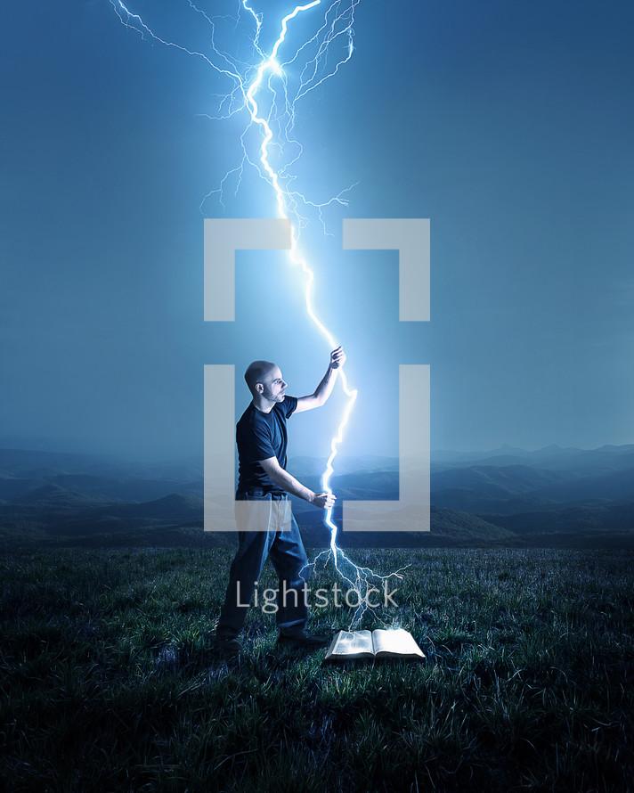 man holding a lightning strike over a Bible
