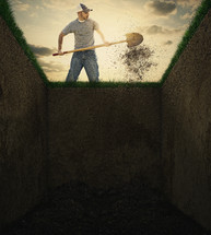 Man digging a grave.