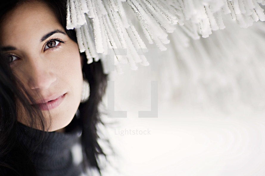 Portrait of woman, brown eyes, brown hair, snow covered tree, winter, fashion