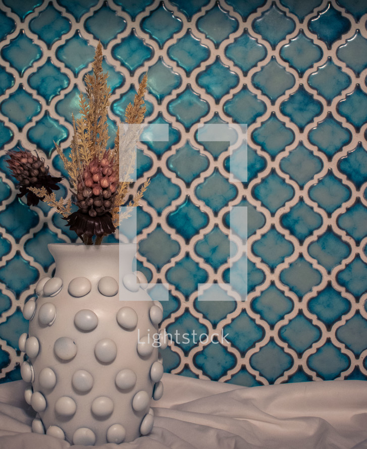 Vase with Blue Tile Background
