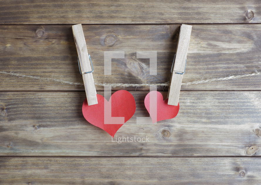 paper hearts on clothespins 