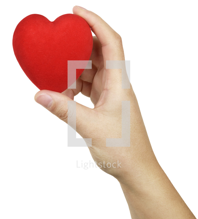 hand holding a red heart 