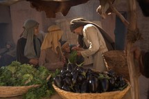 a man selling vegetables at the market in biblical times 