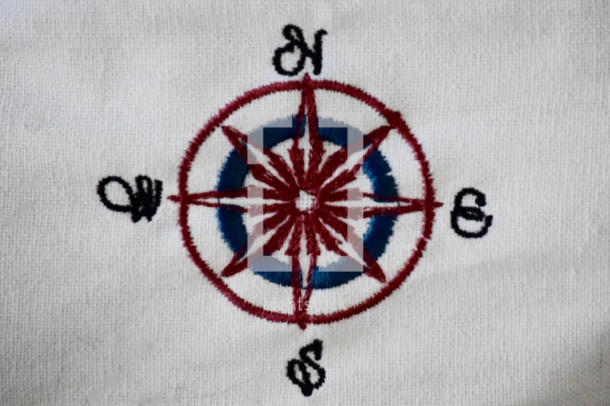embroidered compass
