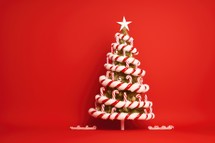 Christmas tree with candy canes on a red background. 3d illustration