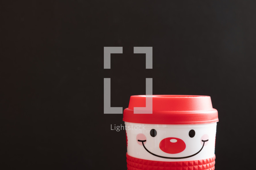 Happy snowman mug on black background