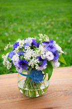 purple and white flowers in a vase 