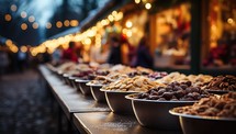 Bowls with candied fruits and nuts on Christmas market in Riga, Latvia