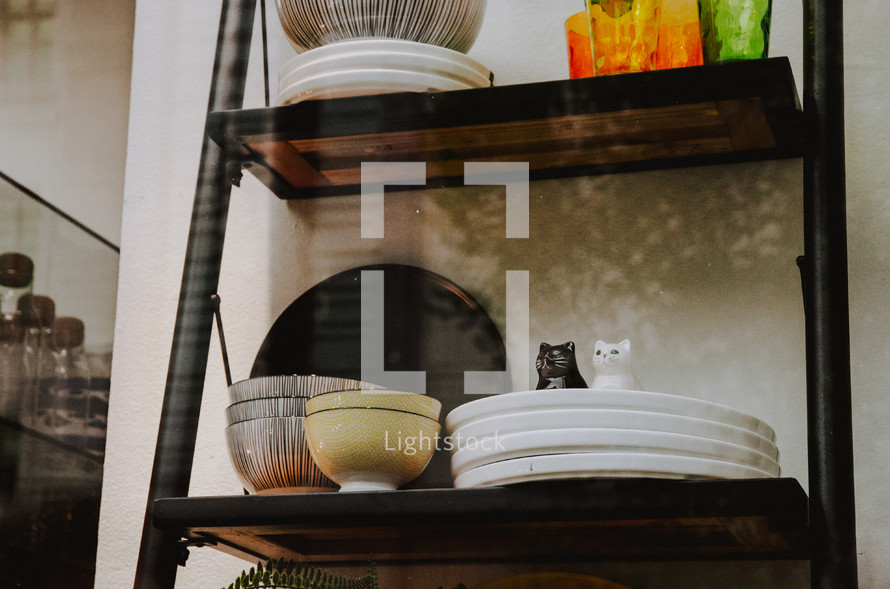 bowls and plates on shelves 