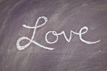 Love written on a chalkboard