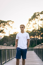 a young man in sunglasses 