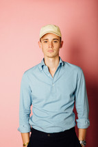 portrait of a young man in a ball cap 