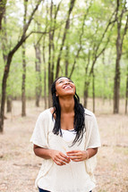 African American woman looking up to God 