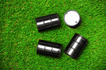 barrels on grass