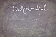 self-control written on a chalkboard