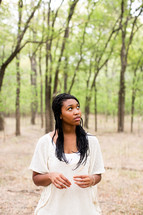portrait of an African American woman standing outdoors 