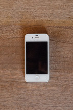 cellphone on a wood floor 