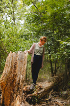 woman, standing, outdoors, posing, fallen tree, log, outdoors, portrait 