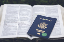 passport on an open Bible 