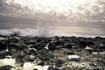 waves crashing onto a rocky beach