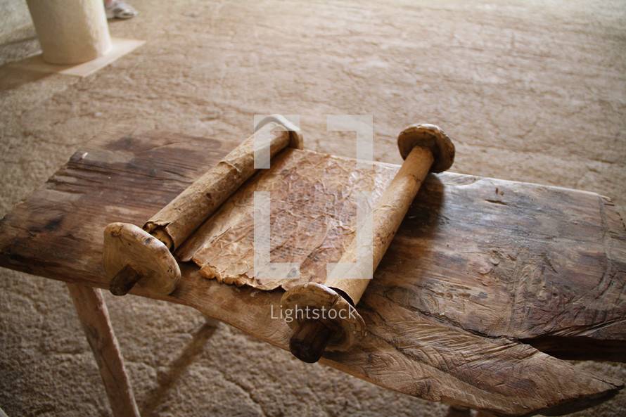 Old scroll on wooden table