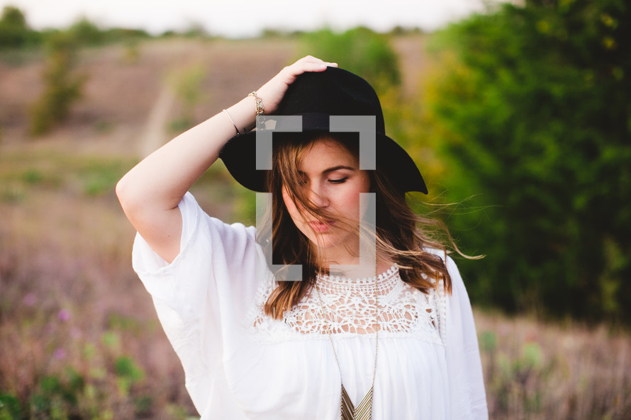 posing, woman, portrait, hat, outdoors, linen shirt 