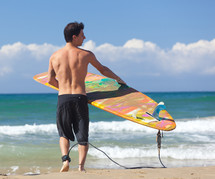 man surfing in the ocean 