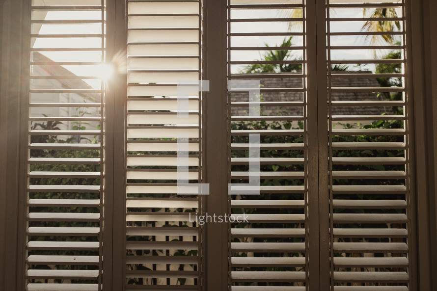 sunlight through shutters 