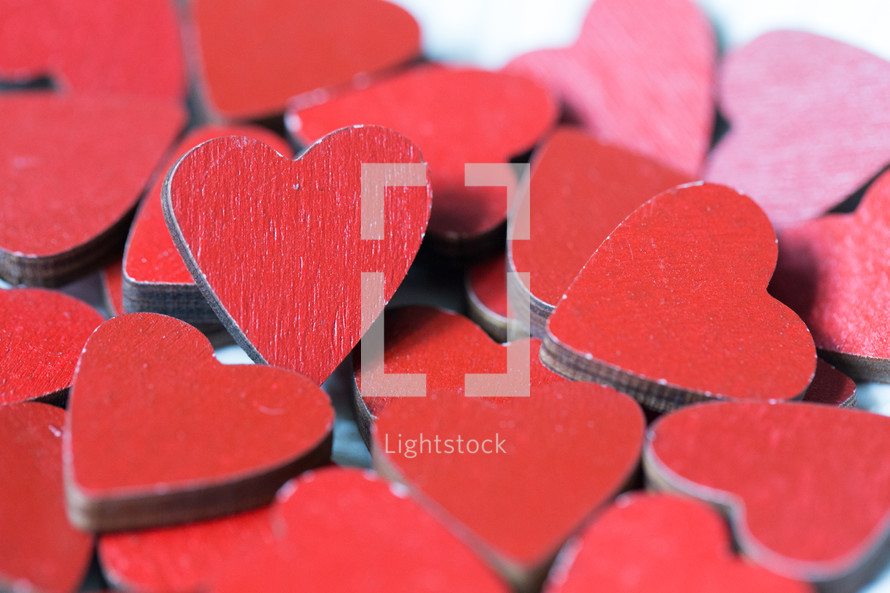 pile of red wooden hearts 
