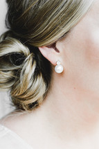 a bride with her hair in a bun 