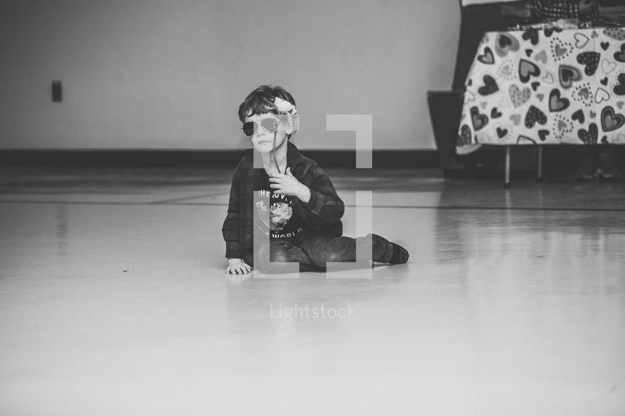 child sitting on the floor 