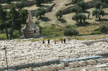 visitors at a cemetery in Jerusalem 