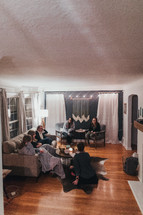 young women huddle for a Bible study 