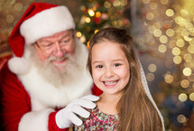 toddler girl with Santa Claus 