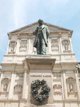 Statue of writer Alessandro Manzoni in front of San Fedele church, Milan, Italy