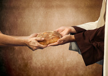 Jesus gives the bread to a beggar on brown background