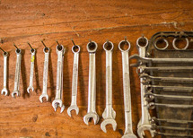 row of hanging wrenches 
