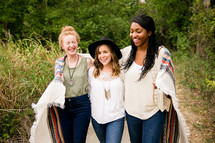 wrapped, blanket, woman, african american, laughing, friends, friendship 
